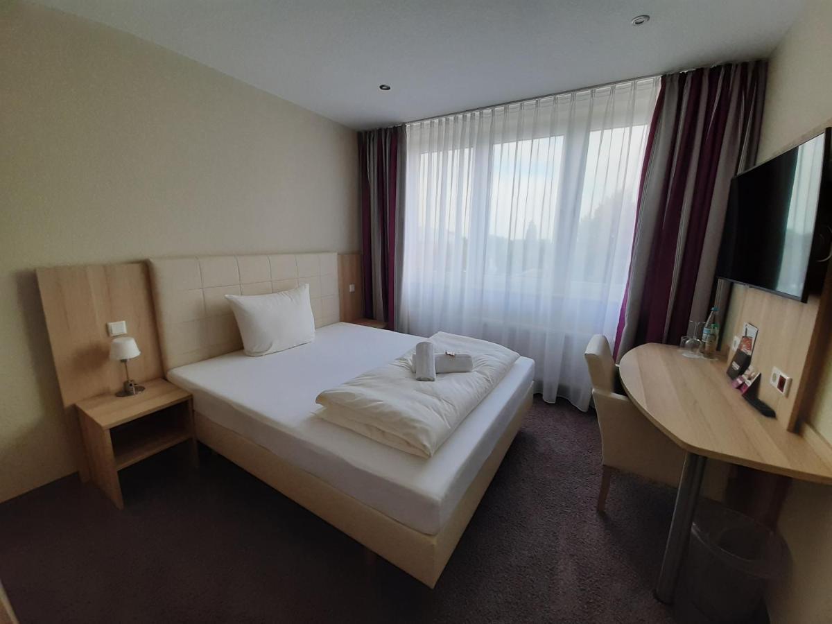 Hotel Siebenschlaefer Am Wasserturm อัลสดอร์ฟ ภายนอก รูปภาพ