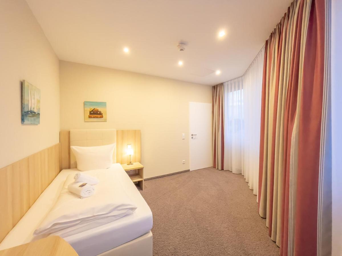 Hotel Siebenschlaefer Am Wasserturm อัลสดอร์ฟ ภายนอก รูปภาพ